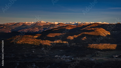 Sunrise in the Bellmunt viewpoint. Views of the Pyrenees and the Puigmal summit (Osona, Barcelona province, Catalonia, Spain, Pyrenees)