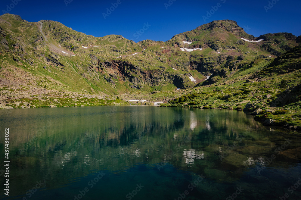 Tristaina peak and lakes, in summer (Andorra, Pyrenees) Tristaina peak and lakes, in summer (Andorra, Pyrenees)