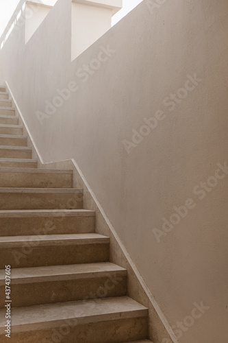 Minimal aesthetic architecture concept. Beige wall and stairs