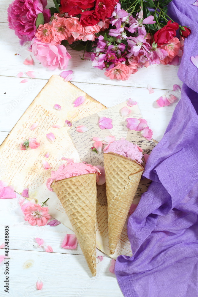 Still life with fruit ice cream and a bouquet of roses on a white background Still life with fruit ice cream and a bouquet of roses on a white background