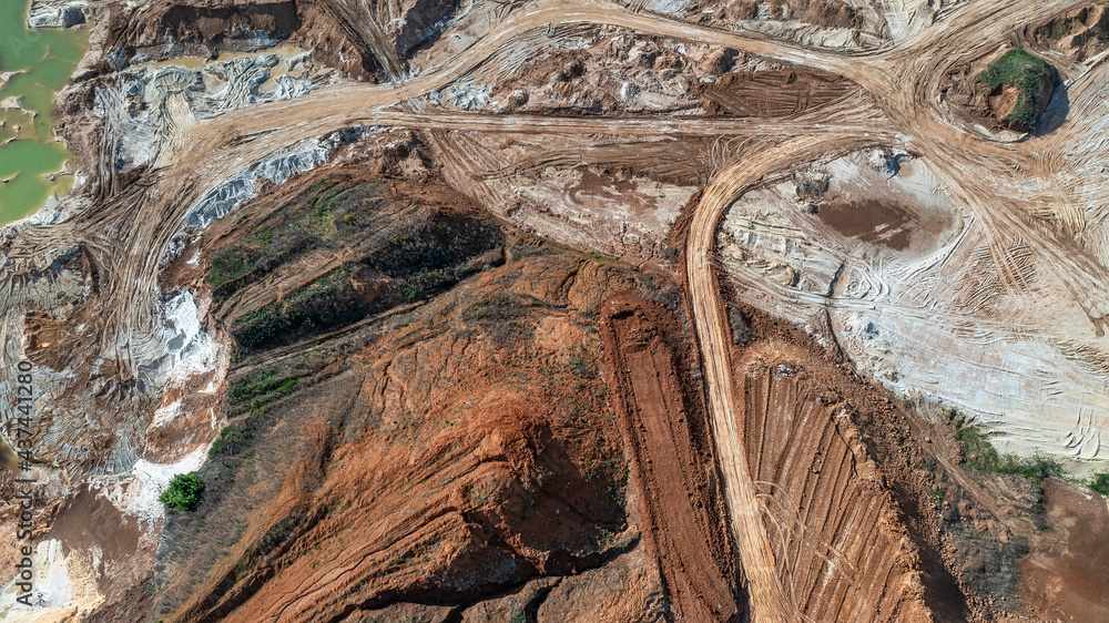 Aerial view to sand quarry, abstract earth patterns