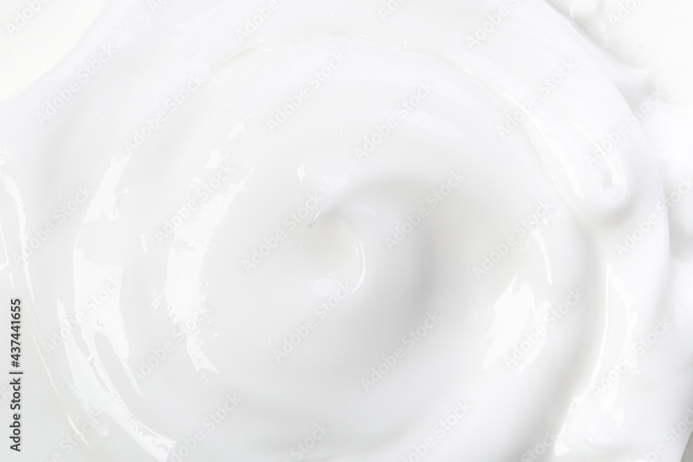 White face cream swirl swatch isolated. Body lotion drop. Cosmetic makeup product sample on white background. White face cream swirl swatch isolated. Body lotion drop. Cosmetic makeup product sample on white background.