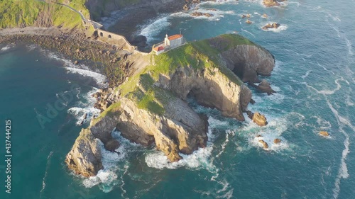 Aerial view of the island and the Gaztelugatxe temple. Northern Spain in summer
Manmade way to small isle on the Atlantic shore in Biscay region. Beautiful sunny morning.