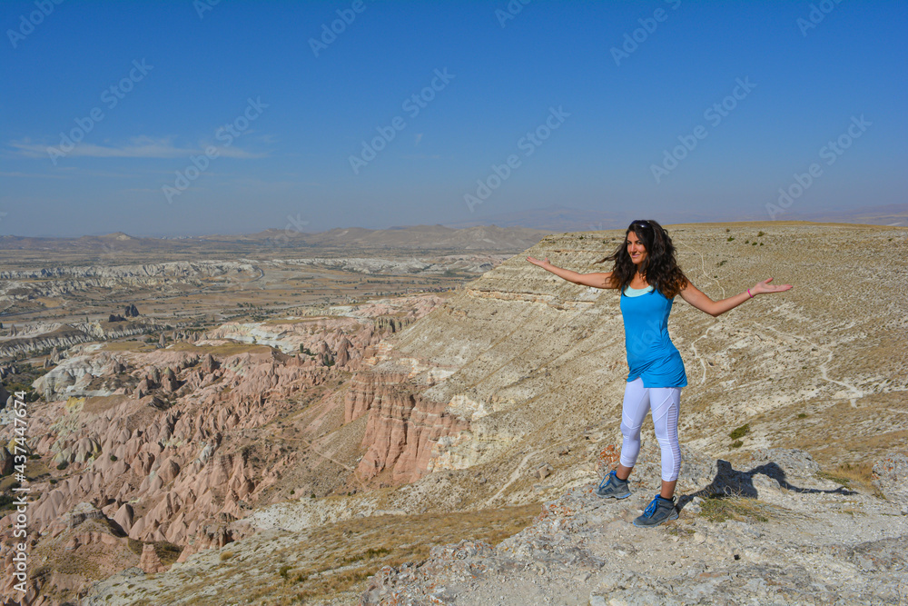 Fototapeta premium Girl in the Red and Rose Valley