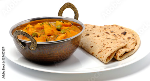 Indian style cottage cheese dish or curry with roti photo