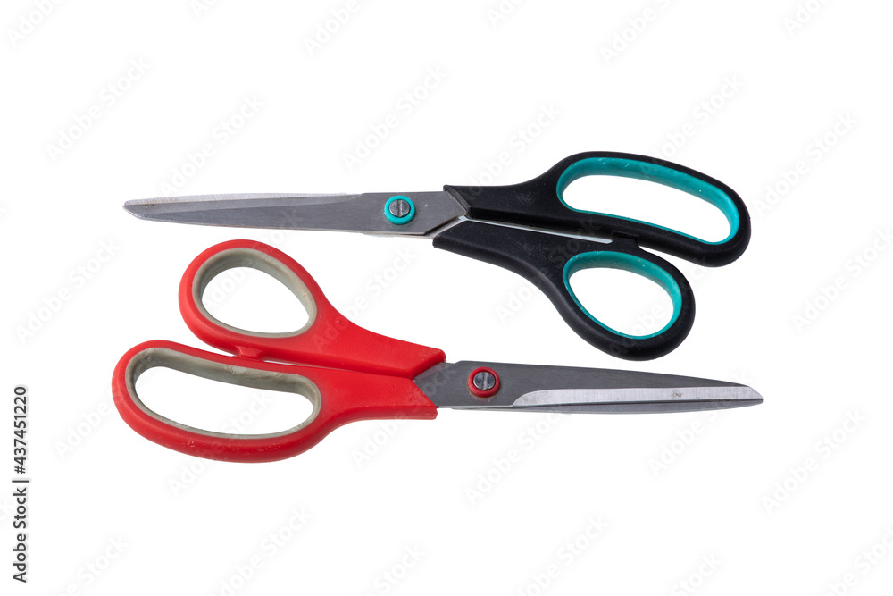 A pair of used scissors on white background A pair of used scissors on white background