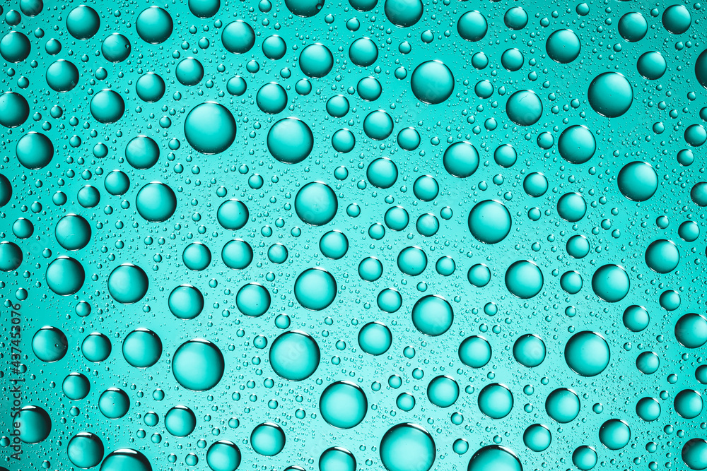 Rain window background. Water drops background. Wet glass surface texture. Bubble dew pattern. Transparent window green raindrops. Bright white environment condensation texture. Rain window background. Water drops background. Wet glass surface texture. Bubble dew pattern. Transparent window green raindrops. Bright white environment condensation texture.