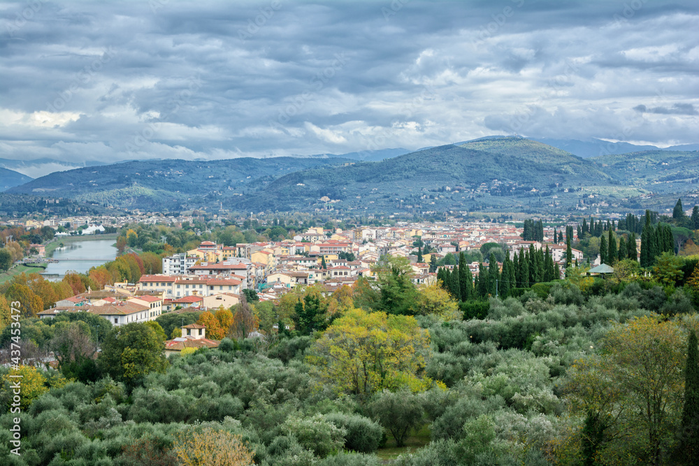 View from Piazzale Michelangelo to the Botanical Garden (Giardino dell'Iris), Arno river and hills, Florence, Italy