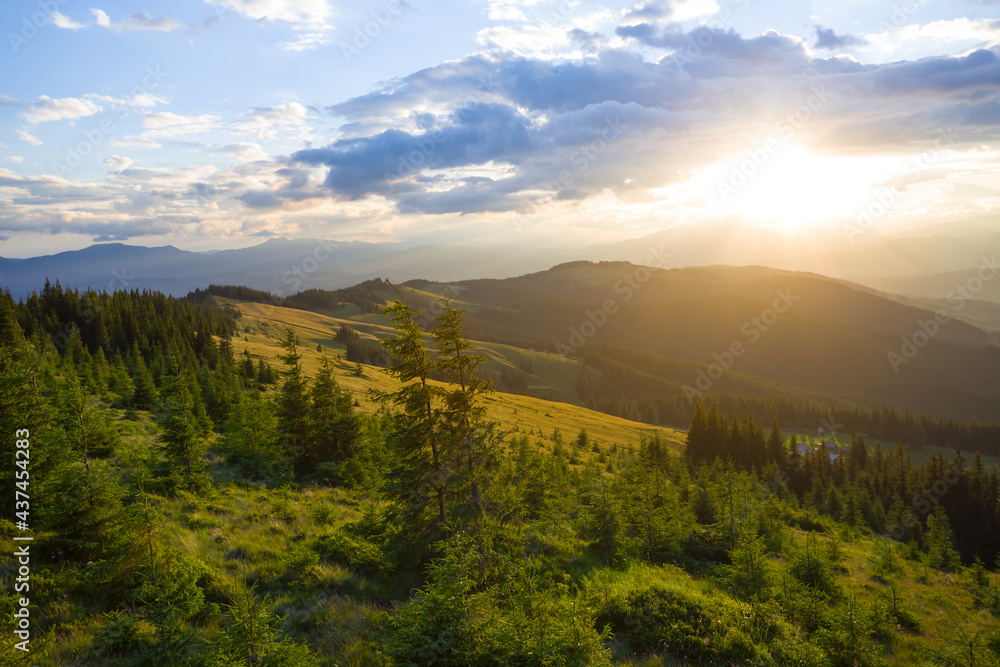green mountain valley at the dramatic sunset, beautiful travel background
