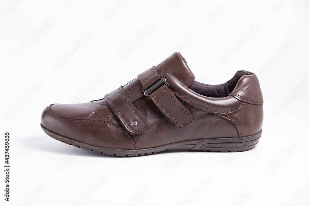 Male brown leather elegant shoe on white background, isolated product, comfortable footwear. Male brown leather elegant shoe on white background, isolated product, comfortable footwear.