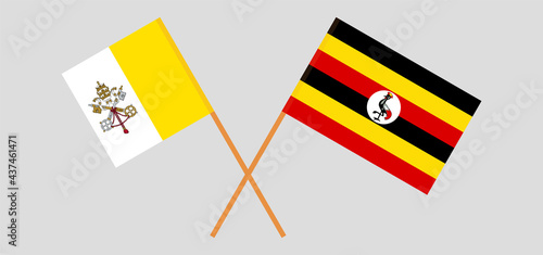 Crossed flags of Vatican and Uganda. Official colors. Correct proportion