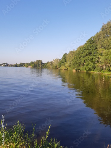 blue sky and river and trees