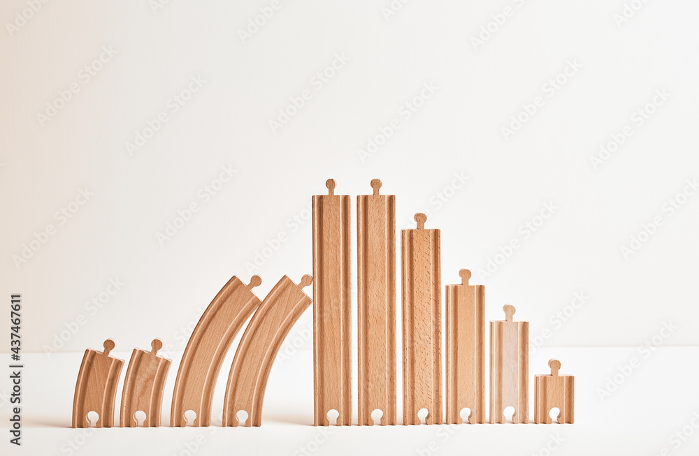 The large family concept: four childrens, parents, grandmother, grandfather, great-grandmother, great-grandfather, sister, brother. Wooden eco friendly toy railroad. Genus lifetime. Creative symbol The large family concept: four childrens, parents, grandmother, grandfather, great-grandmother, great-grandfather, sister, brother. Wooden eco friendly toy railroad. Genus lifetime. Creative symbol