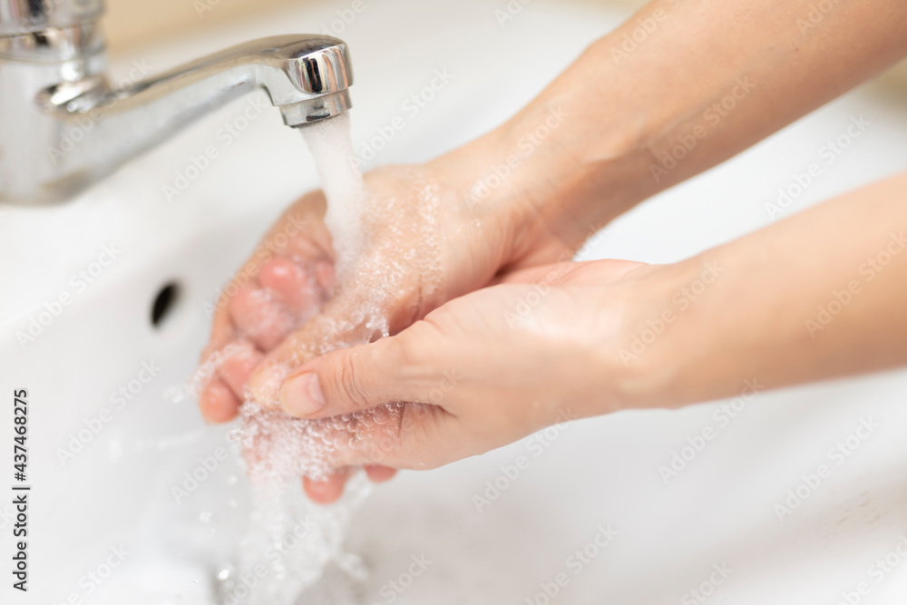 washing hands with soap