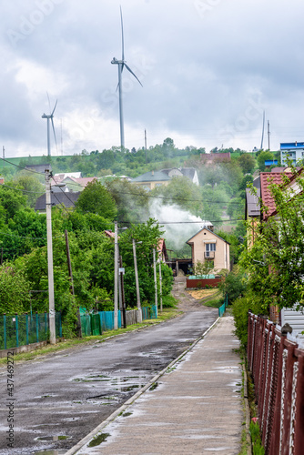 Staryi Sambir, Ukraine - 20.05.2021: Wind Turbines on Top of the Mountains. photo