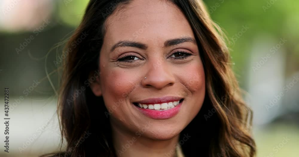 Ethnically diverse happy young woman smiling portrait Ethnically diverse happy young woman smiling portrait