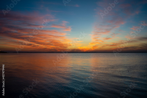 sunset over the beach © Valeria