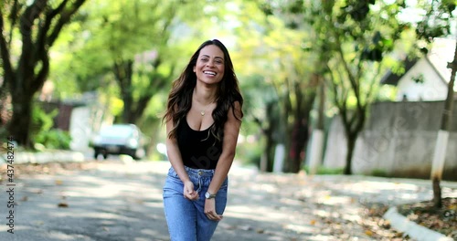 Girl bouncing breasts happy dancing outside