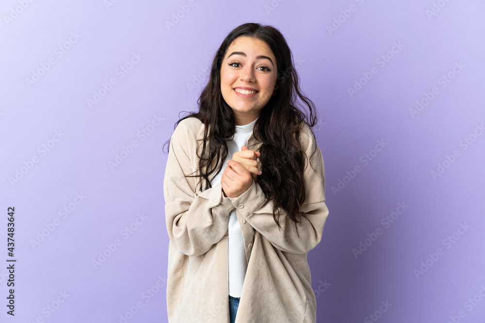 Young caucasian woman isolated on purple background laughing Young caucasian woman isolated on purple background laughing