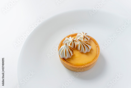 Lemony Meringue Tart on a white plate