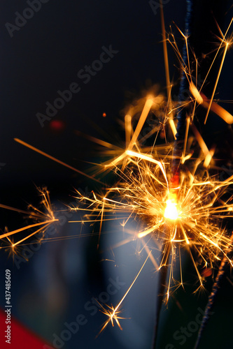 Close up of burning sparkler effect