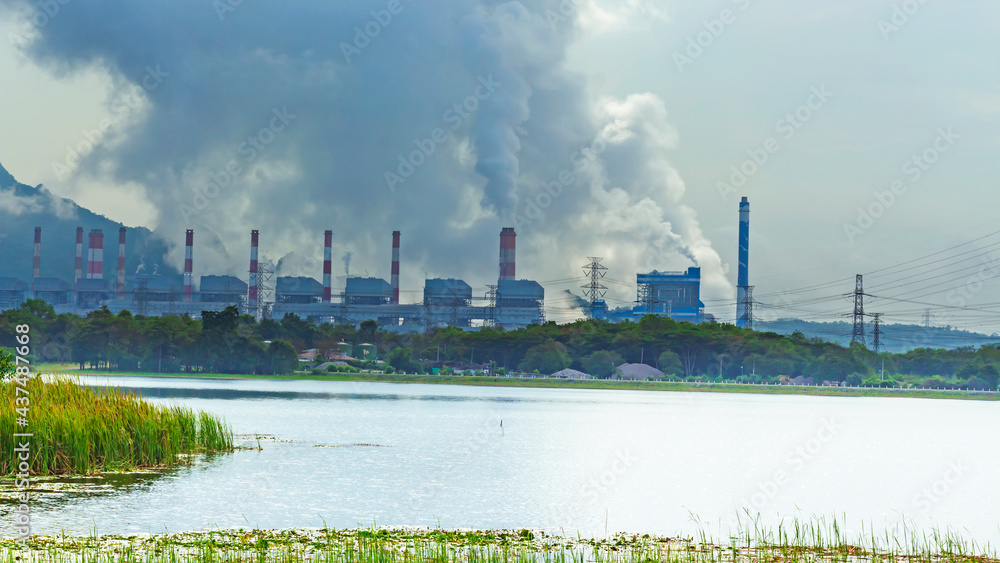 The hot steam from a chimney at a coal-fired power plant