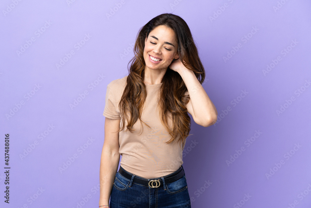 Woman over isolated purple background laughing Woman over isolated purple background laughing