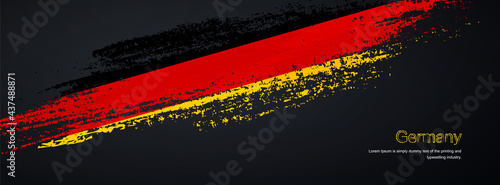 Grunge brush of Germany flag on shiny black background. Creative glitter sparkle brush paint vector illustration