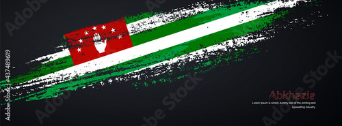 Grunge brush of Abkhazia flag on shiny black background. Creative glitter sparkle brush paint vector illustration