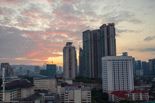 Photography view of kuala lumpur skyline during sunrise