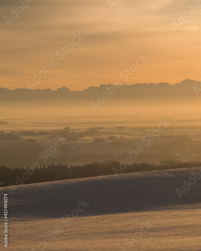 a snowy cold sunrise in the mountains