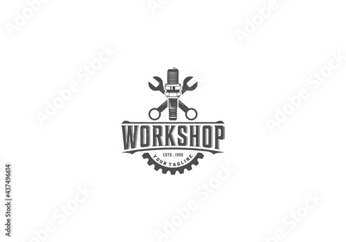 logo for workshop with gear and piston illustration