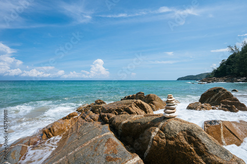 beach and rocks at banana beach Phuket Thailand