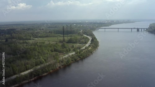Wallpaper Mural Flight of the copter over the river and the road. Bridge on the horizon. A beautiful view of the nature of Russia from a height. Torontodigital.ca
