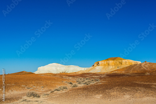 White and yellow eroded Mesa land forms of The Breakaways near Cobber Pedy in South Australia, Australia