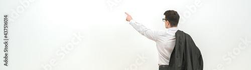 The man gesturing on the background of the white wall background