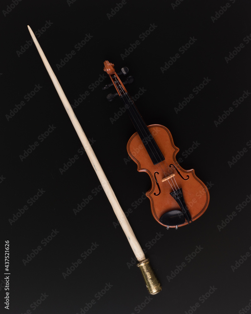 conductor stick isolated on black background conductor stick isolated on black background