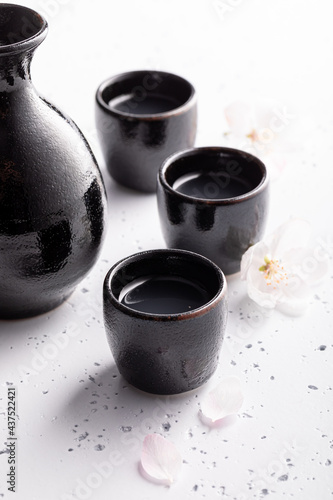 Unfiltered sake as traditional alcohol. Japanese habit of drinking alcohol.