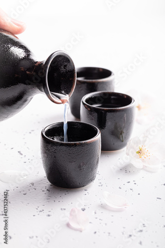 Strong sake as traditional alcohol. Japanese habit of drinking alcohol.