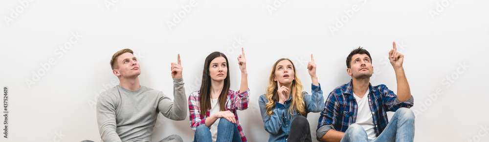 The four friends gesture on the white background The four friends gesture on the white background