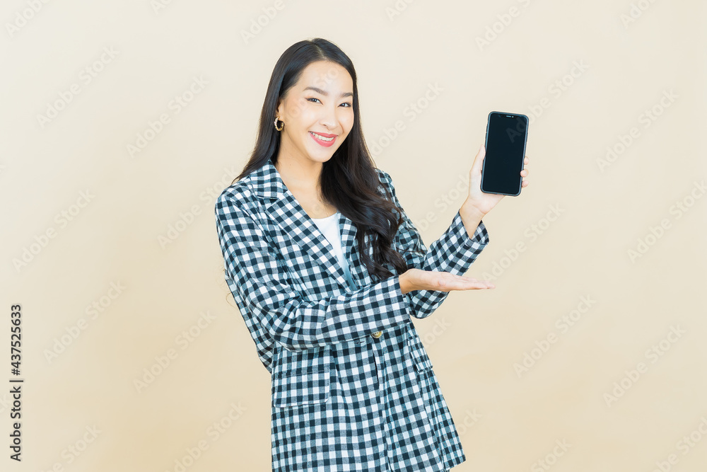 Portrait beautiful young asian woman smile with smart mobile phone Portrait beautiful young asian woman smile with smart mobile phone