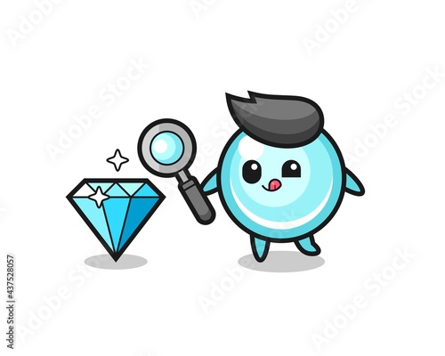 bubble mascot is checking the authenticity of a diamond