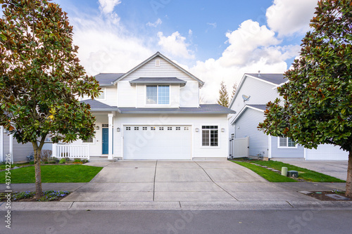 white house with blue skies