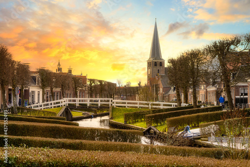 The small city IJlst (Friesland, The Netherlands) during a lovely sunset/sunrise photo