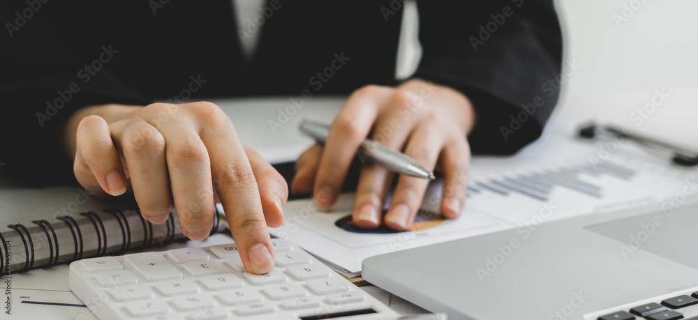 accountant or banker calculating or checking balance. Bookkeeper or financial inspector making financial report. Home finances, investment, economy, saving money or insurance concept accountant or banker calculating or checking balance. Bookkeeper or financial inspector making financial report. Home finances, investment, economy, saving money or insurance concept