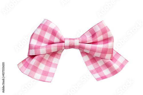Pink beautiful bow isolated on white.