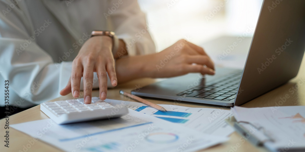 Business woman hand pointing business document during discussion at meeting discussion and analysis data the charts and graphs showing the results at meeting.Business finances and accounting concept Business woman hand pointing business document during discussion at meeting discussion and analysis data the charts and graphs showing the results at meeting.Business finances and accounting concept