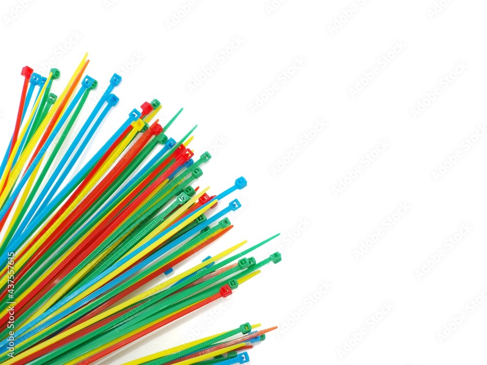 multi colored cable ties on a white background multi colored cable ties on a white background
