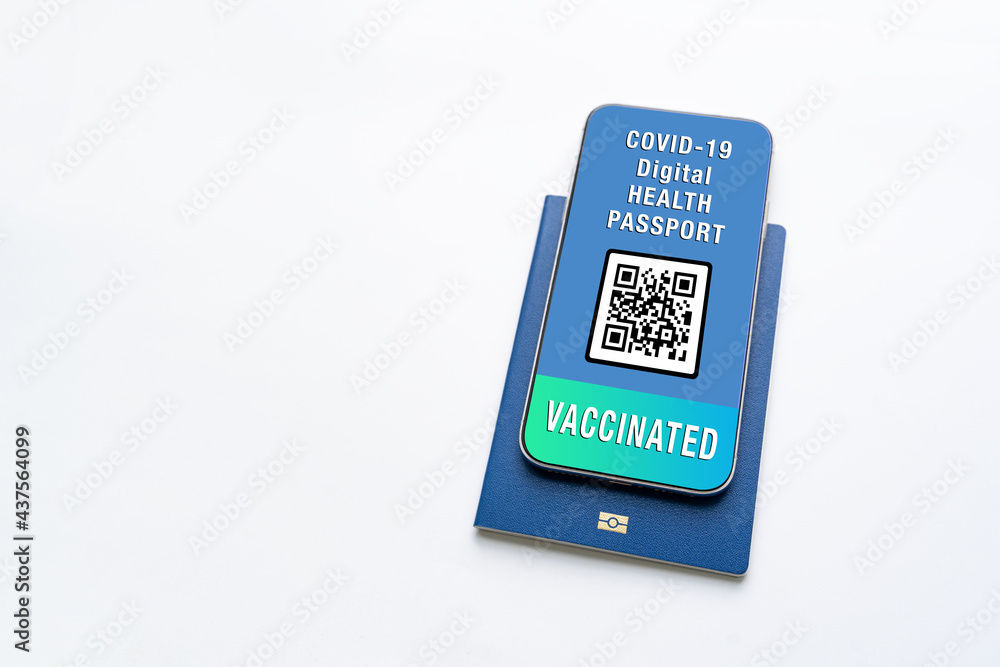 health or vaccine passport for COVID-19 displayed on smartphone held in male's hand with copy space. digital Covid-19 Health Certificate which proves that person was vaccinated health or vaccine passport for COVID-19 displayed on smartphone held in male's hand with copy space. digital Covid-19 Health Certificate which proves that person was vaccinated
