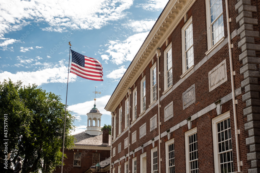 A close up of the Independence Hall with American flag in Philadelphia, Pennsylvania, United States